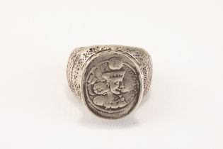 An Islamic Tribal Turkmen Silver Ring with a Sasanian Coin. 77g