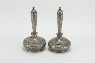 A Pair of Silver Indian or Kashmiri Tested Silver Rosewater Sprinklers. H: Approximately 12.5cm 144