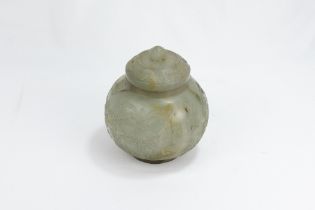 An Indian Mughal Style Jade Sugar Pot with a Lid Decorated with Floral Patterned Carvings. H: Appro