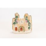 A Victorian Staffordshire Flat Back Castle Painted with a Clock & Polychrome Sprigged Decoration.

H