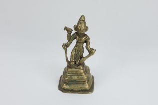 An Indian Bronze Buddha from the 19th Century. H: Approximately 13cm