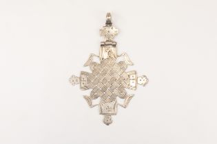 A Tribal Ethiopian Coptic Silver Cross Pendant from the Early 20th Century. L: Approximately 9cm 33