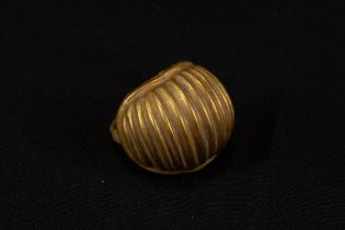 A Western Asiatic Gold Shell- Shaped Single Earring Shaped into a Shell Circa 1st Millennium B.C. -