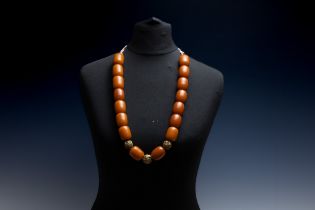 A Tribal Yemeni Amber Colour Beads with 3 Yellow Metal Beads Necklace. 224g