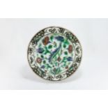 An Islamic Iznic Dish Depicting Multicoloured Floral Patterns from the 18th Century.

D: Approximate