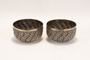 A Pair of Indian Silver Bowls Decorated with Floral Patterns. D: Approximately 9.8cm H: Approximate