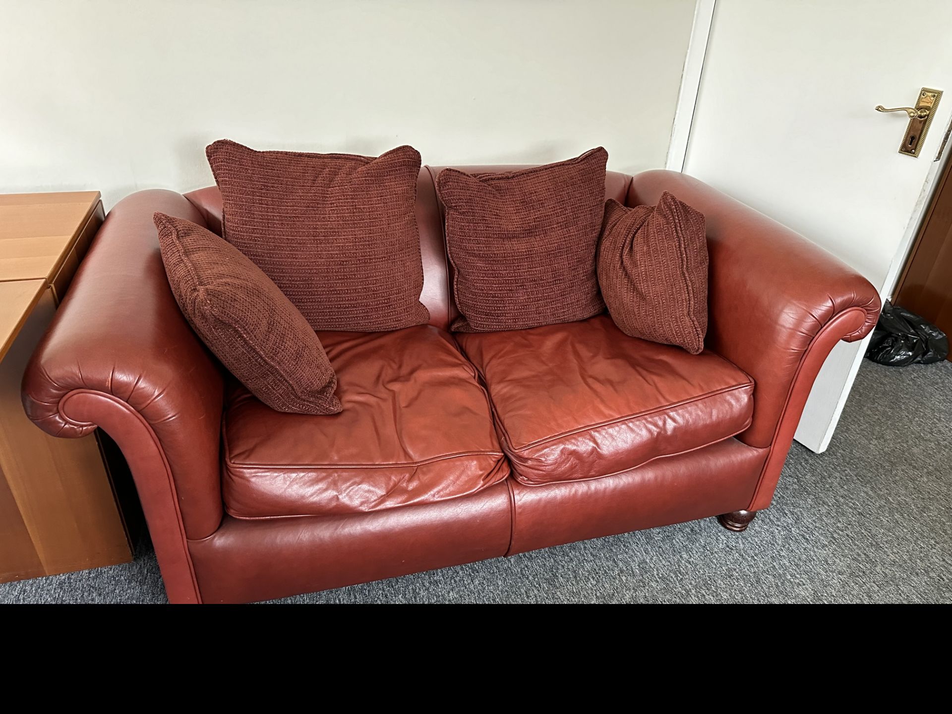 2 SEATER RED LEATHER SOFA