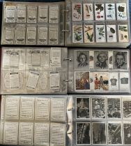 Collection of cigarette cards in 11 albums, complete and part sets in variable condition, with