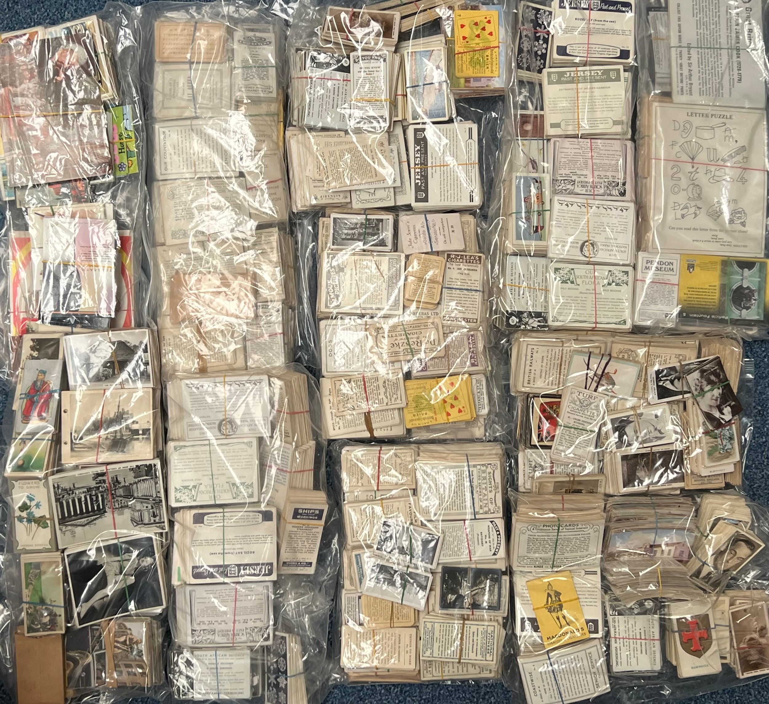 Collection of cigarette cards in banded sets?/part sets, partially ...