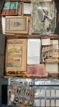 Large collection of foreign cigarette and trade cards, in 2 fruit trays, with many sets and part