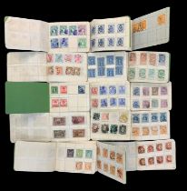 World early issue stamp collection in 42 small booklets with =FU duplication, focus on postmarks