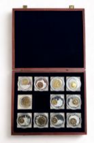 History of British Currency set of 11 medallions each with certificate, in wooden presentation case.