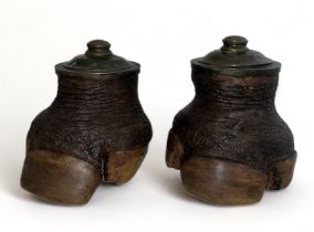 Early 20th Century taxidermy pair of Rhinoceros feet tobacco jars, each with a label to the base "