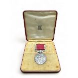 QEII British Empire Medal (Civil) in case of issue to Miss Maud M. Carpenter extremely fine. It