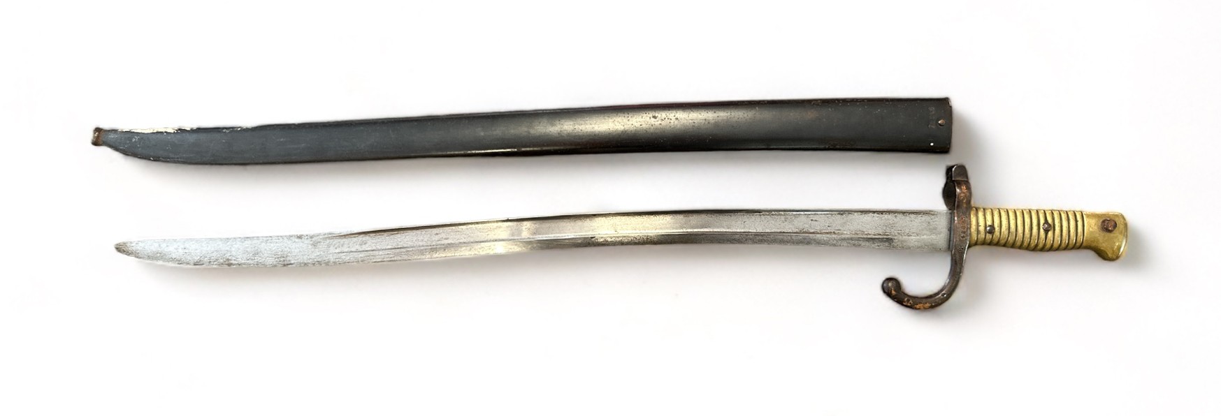 French 1866 pattern chassepot bayonet and scabbard, blade 57cm. Spine of blade marked for 1868.