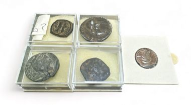 Range of Roman Coins including Constantius II's bronze centenionalis and four others.