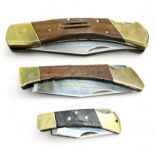 Three stainless steel lock knives