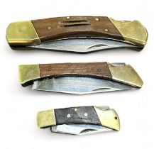 Three stainless steel lock knives