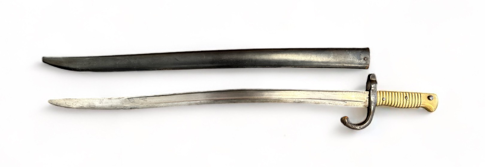 French 1866 pattern chassepot bayonet and scabbard, blade 57cm. Spine of blade marked for 1868.