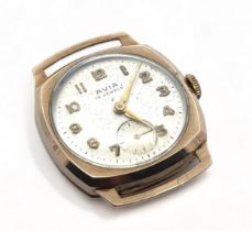 A 9ct gold Avia cushion case gents manual wristwatch. Silvered dial with Arabic numerals, sub