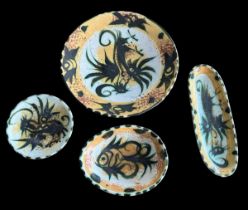 Celtic Pottery Newlyn Cornwall. One plate decorated in the Pheonix pattern 95m. One oval shaped dish