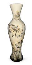 Moorcroft, a Moorcroft tube lined “ Cornflower “ pattern tall vase, impressed mark to base,