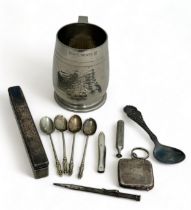 Range of mostly white metal objects. Includes a William IV (1835) toothbrush holder with