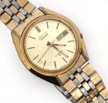 A 1970s Seiko 1 jewel automatic gold plated watch with gold toned dial, baton hour markers and