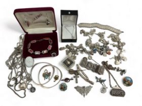 An assortment of silver/925 jewellery and some white metal jewellery items.