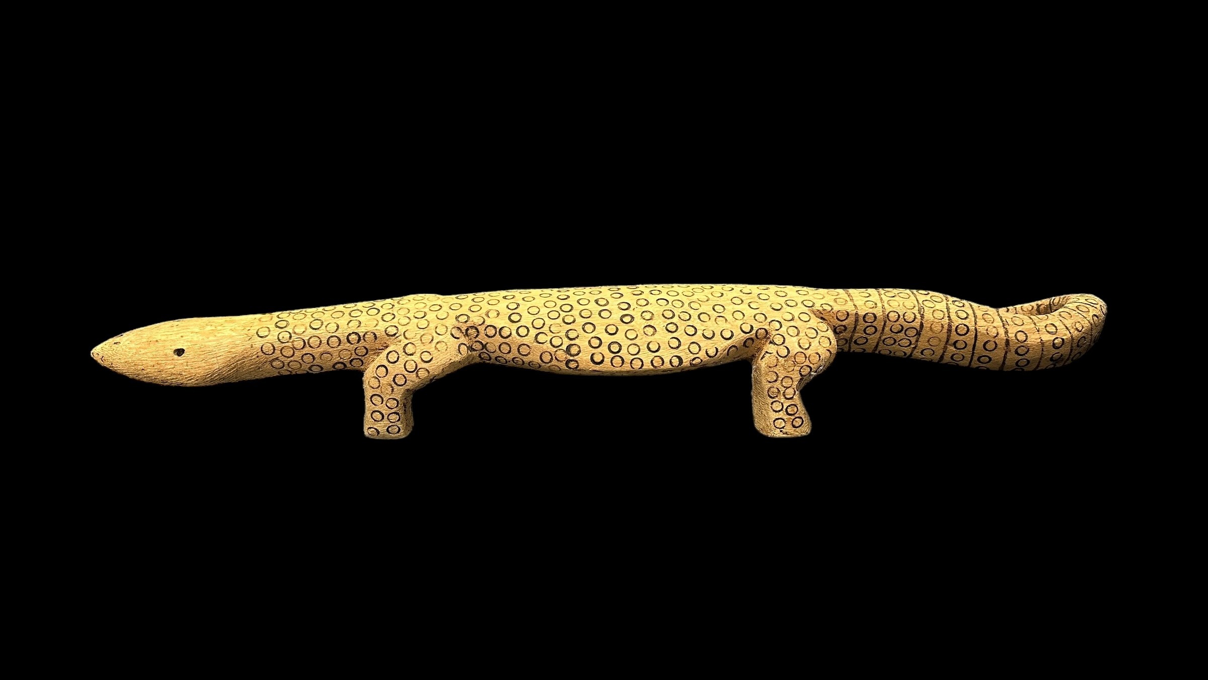 Three Aboriginal Carved Lizards possibly representing Goanna's, monitor lizards, one 87 x 15cm - Image 2 of 4