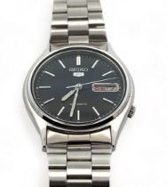 Gents Seiko 5 automatic watch. Grey dial with day/date display. Case 35mm. In working order at