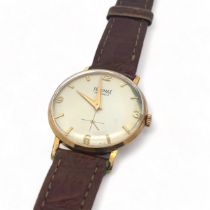 A 1950s Precimax 17 jewels gents manual wristwatch. Gold plated case with Arabic/ baton hour markers