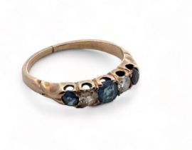A sapphire and diamond five stone ring, size J. Weight 2.05g. Shank thinning, diamonds mismatched.