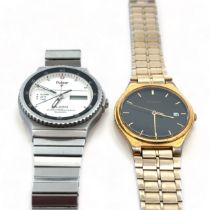 Two quartz Pulsar Watches - A 1980s Pulsar Alarm with white dial and stainless case, Model No.