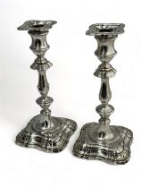 A pair of mid 18th Century English style silver candlesticks with detachable sconces. By Fordham &