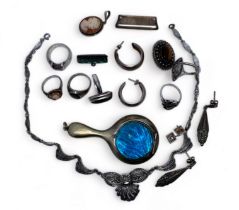 A range of silver jewellery items including a silver and marcasite necklace and earring set, two