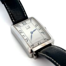 Alfred Dunhill Curved Tank Watch. Stainless steel case and grey dial with Arabic numeral hour