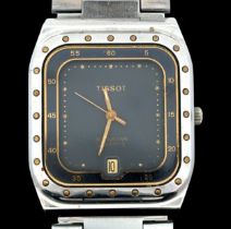 A Tissot Seastar watch with quartz movement. Square dial with dot hour markers, date display and