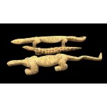 Three Aboriginal Carved Lizards possibly representing Goanna's, monitor lizards, one 87 x 15cm