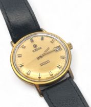 A 1960s Roamer Stingray Roto 44 Date manual gents wristwatch. Gold plated case with gold toned dial,