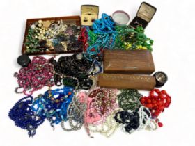 Two inlaid wooden boxes and a large quantity of costume jewellery, bead necklaces, brooches etc,