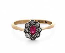 A ruby and diamond cluster ring, set in 18ct yellow gold. Size O. 2.03g.