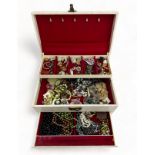 Jewellery box containing a quantity of costume jewellery.