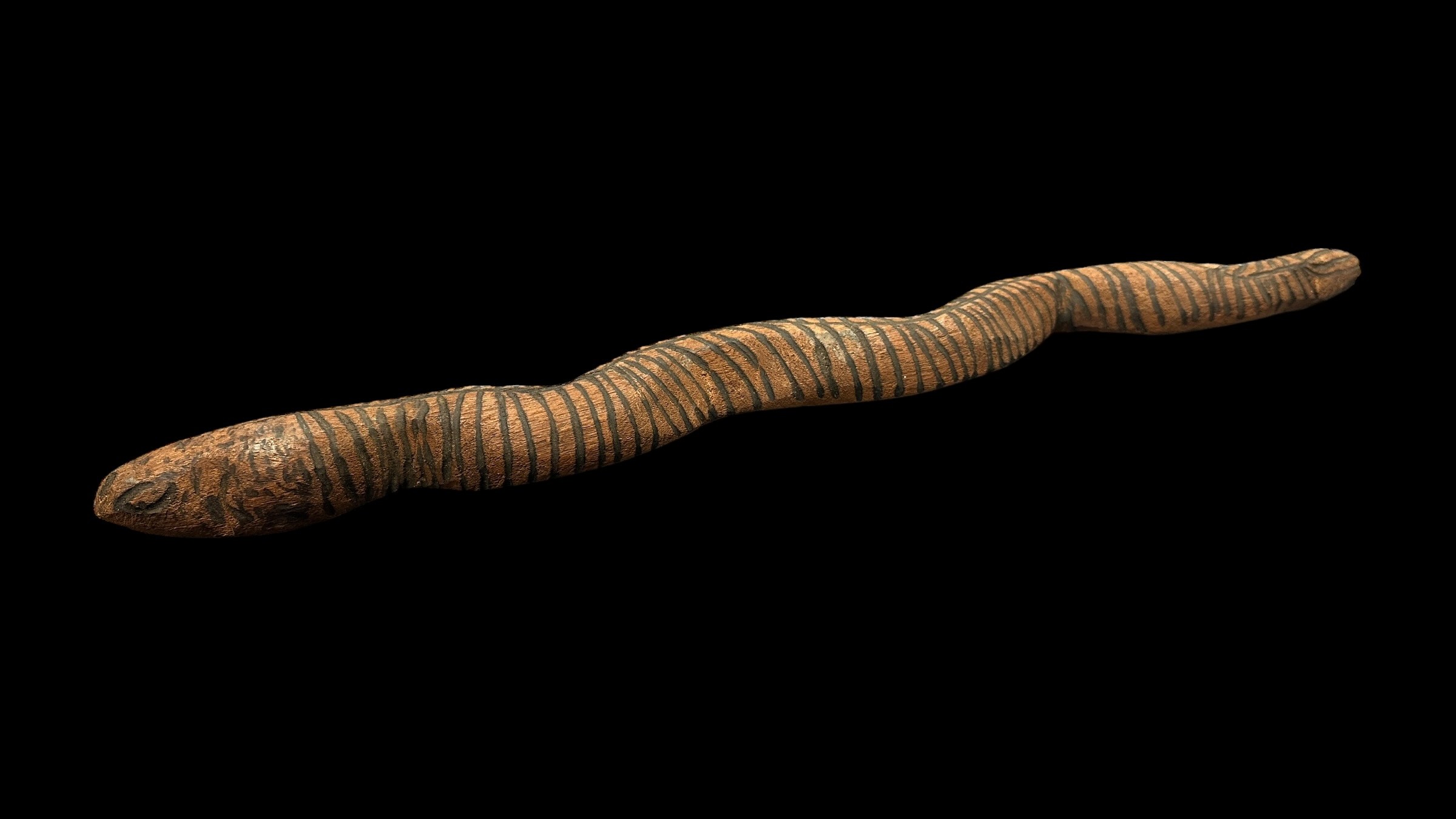 Four Aboriginal Carved Wooden Snakes: The first 92cm in length decorated with poker work dashes - Image 4 of 6