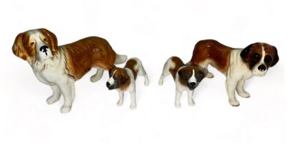 St Bernard ceramic dog group, four ceramic St Bernard figurines of varying sizes, two marked ‘