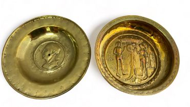 Pair of Nuremberg brass alms bowls. The first with a punch decorated rim, the central panel
