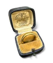 A boxed 22ct gold wedding ring