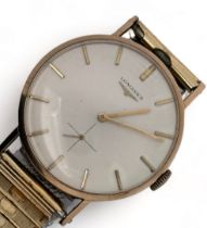 Longines gents 9ct gold watch. Silvered dial with baton hour markers and sub seconds dial. Inscribed