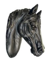 Large unsigned plaster sculpture of a horse’s head. Height 50cm, width 17cm, depth 31cm. Buyer