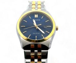 A gents Citizen Eco-Drive E111-S099633 wristwatch. Case diameter 40mm. Two tone date watch with